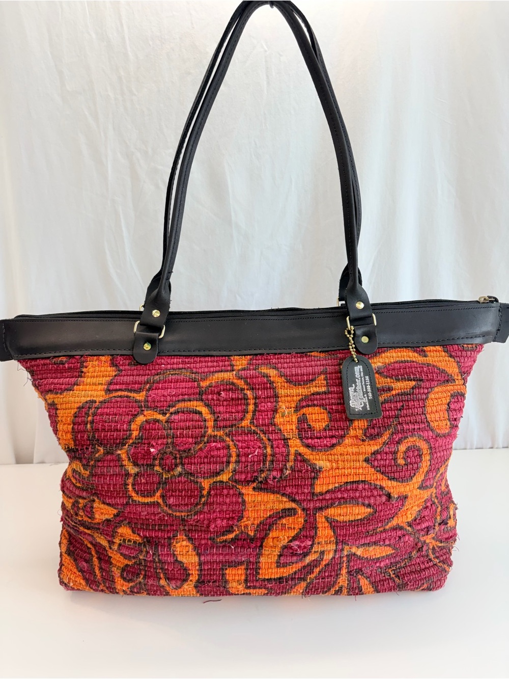 Down Home Leather Company handcrafted carpet bag magenta orange floral boho folk